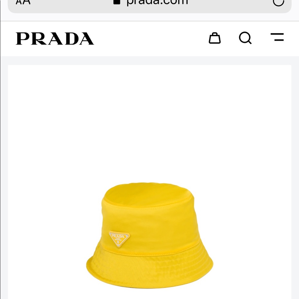 Brand new yellow Prada bucket hat.